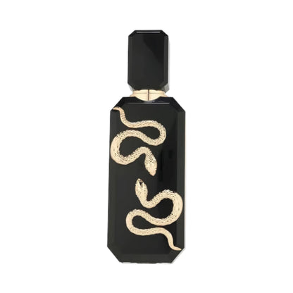 Veneno de French Avenue, fragancia ambarada especiada con manzana, humo y canela, corazón de tabaco y musgo y fondo de vainilla Bourbon y Orcanox™. Oscura y adictiva.